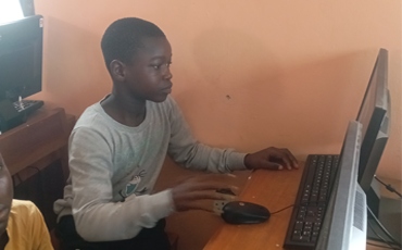 Rural youth participating in graphic design training at Rural Tech Hub